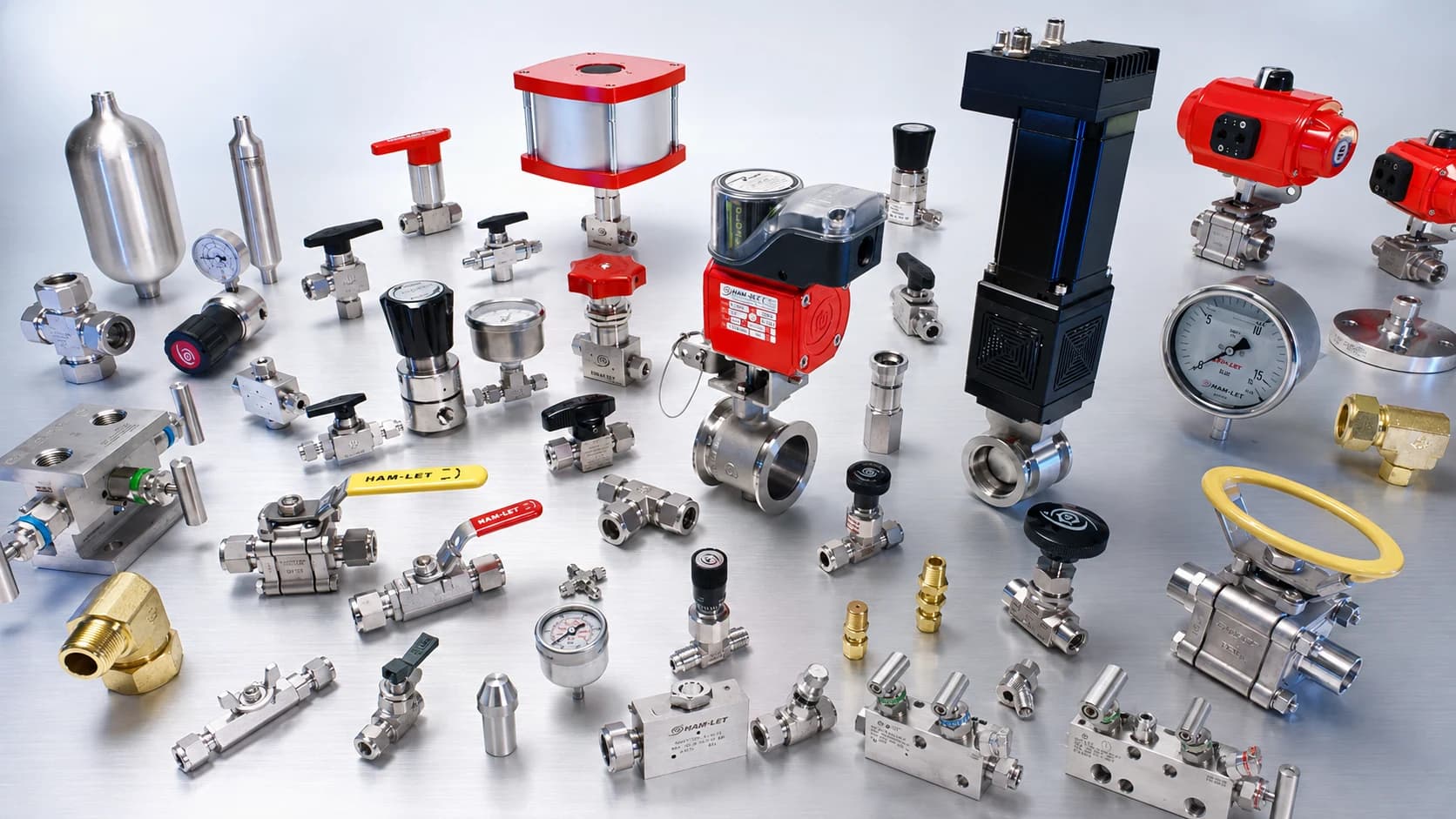 Technician operating instrumentation valves on a process fluid-control system